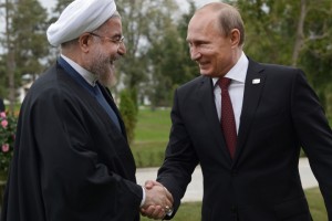 Iranian President Hassan Rouhani (L) shakes hands with his Russian counterpart Vladimir Putin at their meeting in Astrakan, on September 29, 2014 during the Caspian Sea Summit of Russia, Azerbaijan, Iran, Kazakhstan and Turkmenistan. During the summit Putin is set to hold bilateral talks with Rouhani, as world powers seek to seal a nuclear deal with Tehran.   AFP PHOTO / RIA NOVOSTI / ALEXEY NIKOLSKYALEXEY NIKOLSKY/AFP/Getty Images