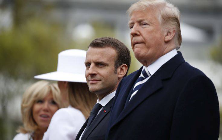 President Donald Trump, French President Emmanuel Macron, first lady Melania Trump and Brigitte Macron stand during a State Arrival Ceremony on the South Lawn of the White House in Washington, Tuesday, April 24, 2018. (AP Photo/Carolyn Kaster)